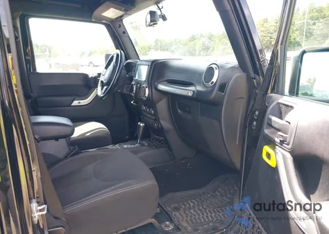 2016 Jeep Wrangler Unlimited Rubicon z USA, uszkodzony, nr VIN 1C4HJWFG9GL261255